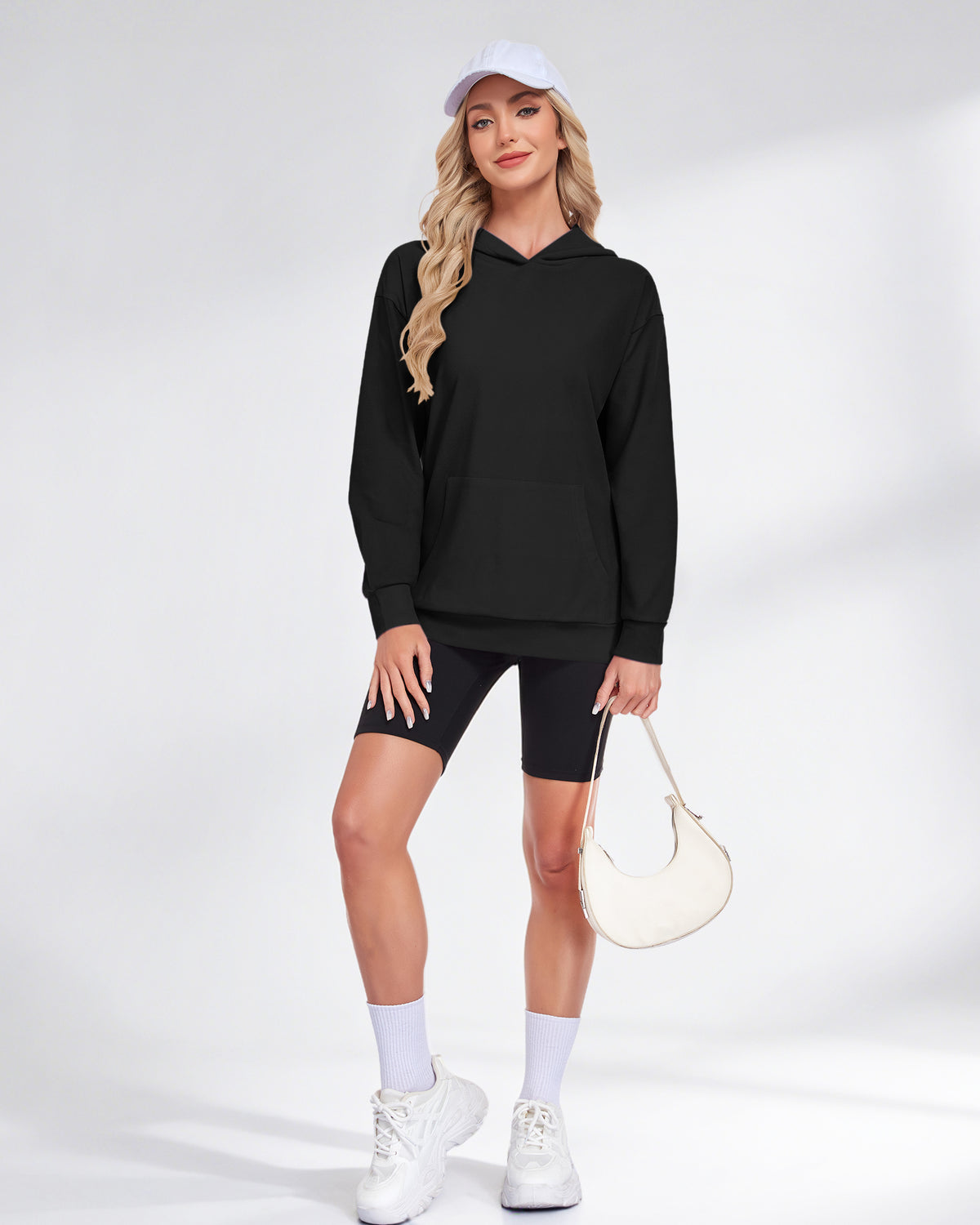 AUSELILY black pullover hoodie with long sleeves, dropped shoulders, and a front kangaroo pocket