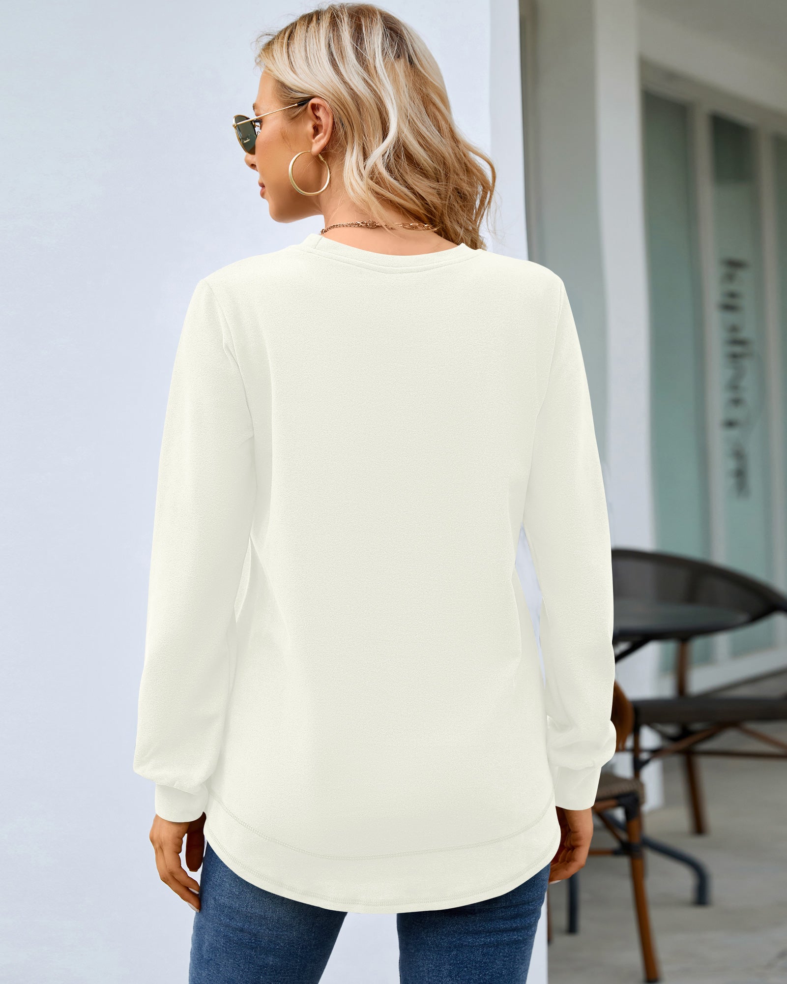 Back view of AUSELILY women's white long sleeve crewneck sweatshirt