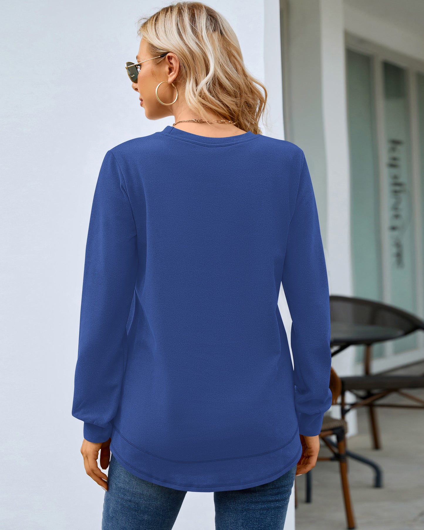 Back view of AUSELILY women's royal blue long sleeve crewneck sweatshirt